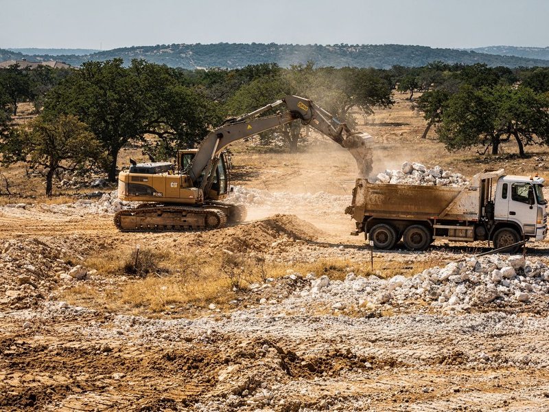 Dump truck and fill dirt on a Fort Worth, TX site