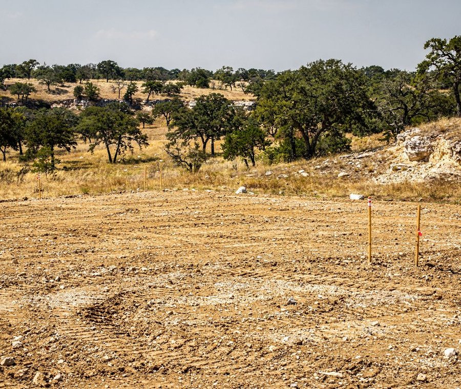 Graded building pad on a cleared lot by Excavation Fort Worth in Fort Worth, TX